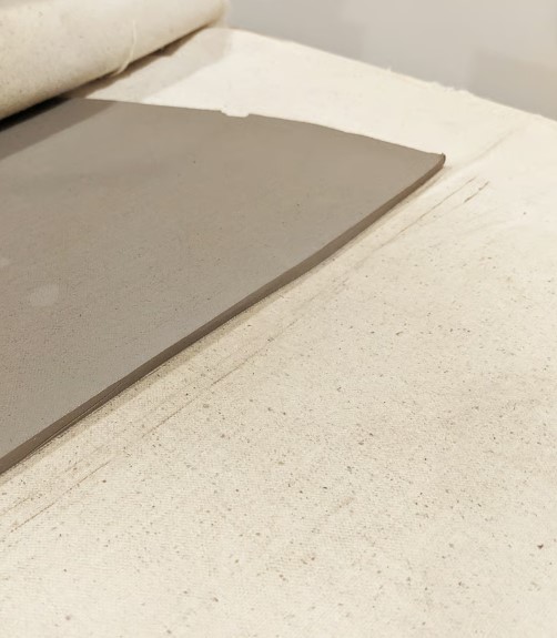 Clay slab rolled by Dragon TS-24 by Doe Ceramics
