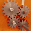 Steel gear mechanism on the Dragon 24TS ceramic slab roller